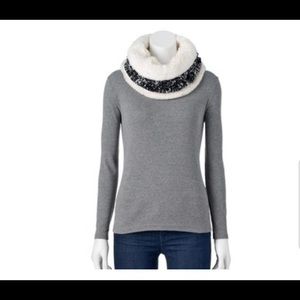 A plush cowl fur neck wrap